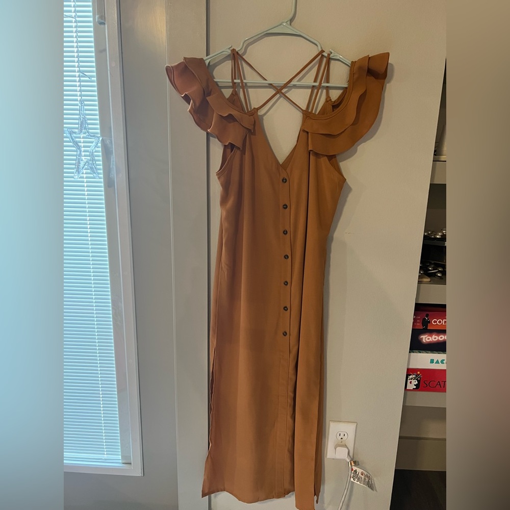 Mustard yellow button down long top with criss cross design